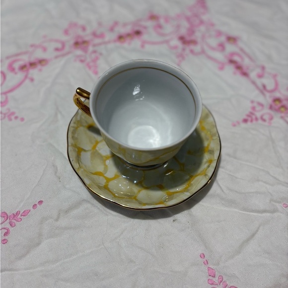 Vintage Gold and White Teacup and Saucer Set with Luxurious Design - Picture 2 of 10